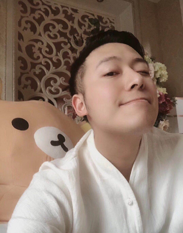 沉稳的第三张照片--认干亲服务网