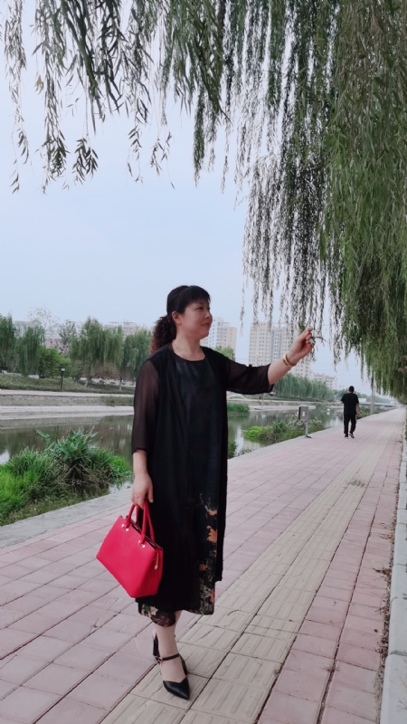 周本玲的第一张照片--认干亲服务网